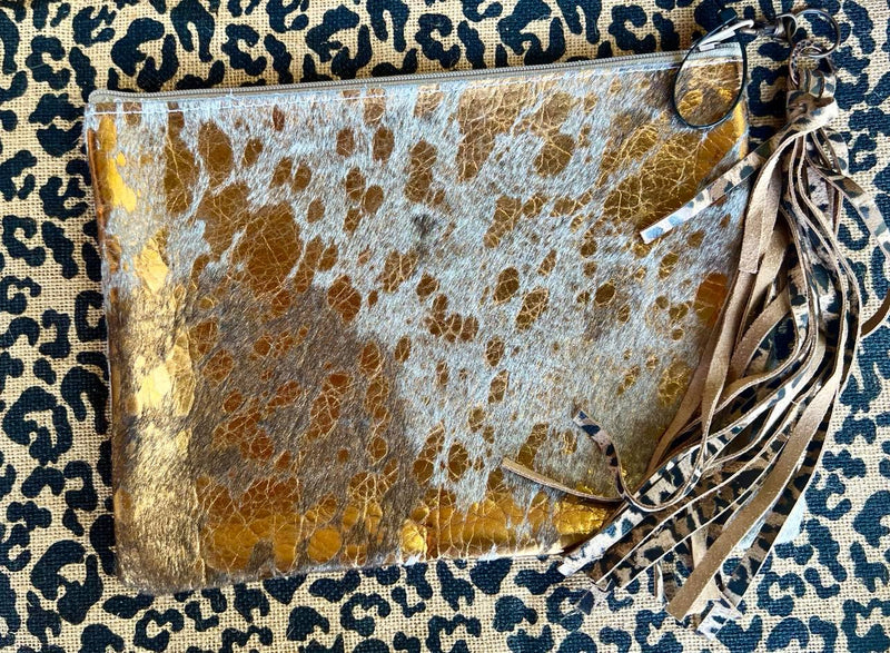 Rose gold acid wash cowhide makeup bag