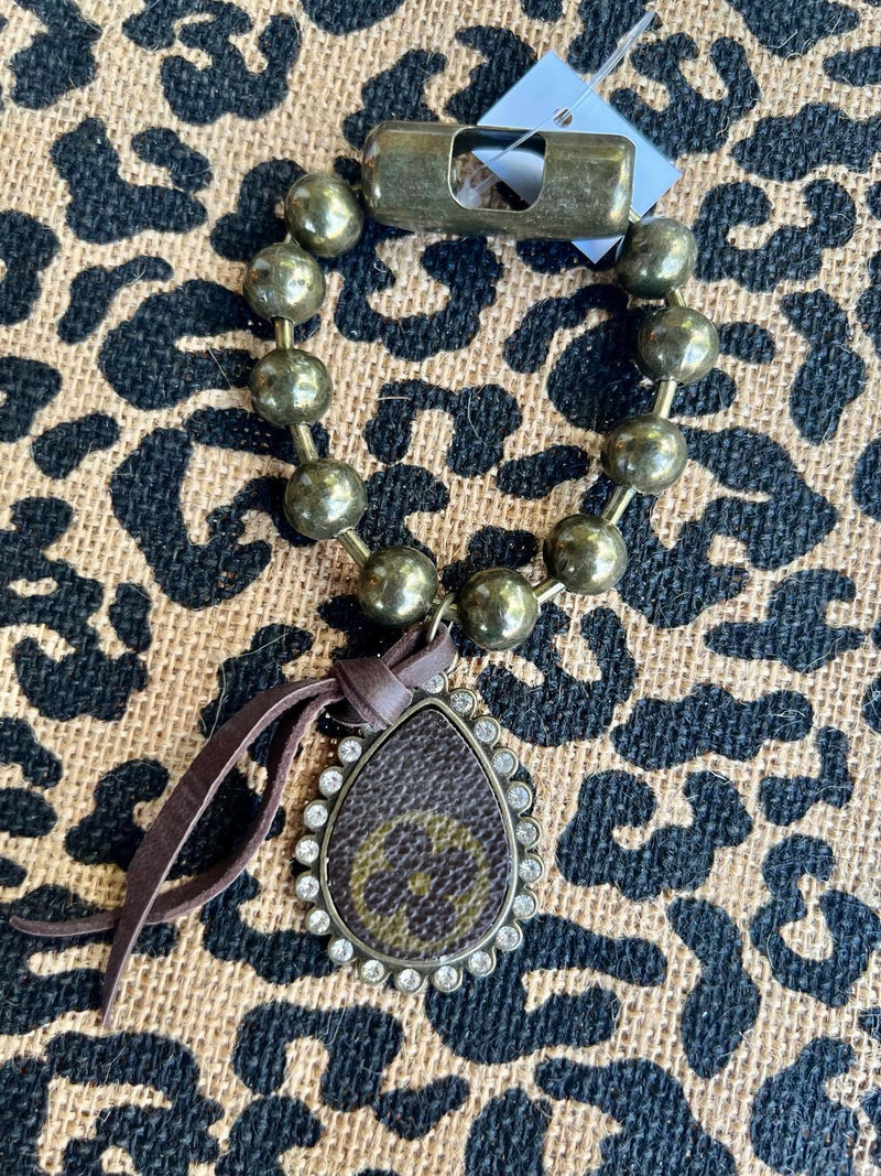 Metal ball bracelet with Louis Vuitton logo